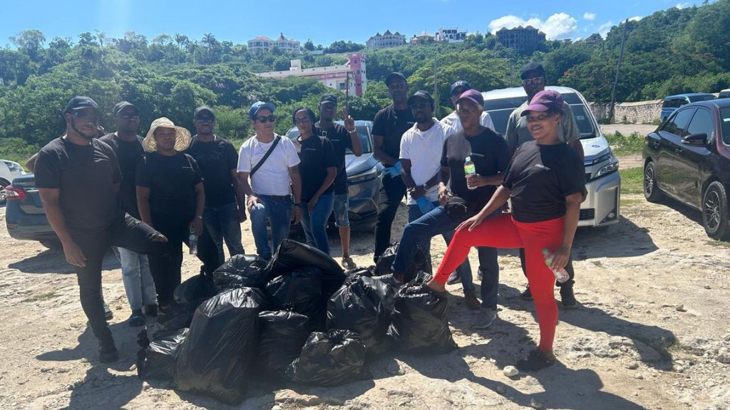 DI staff members remove 20 bags of litter in two hours during Burwood Beach clean-up