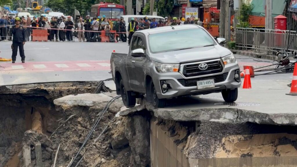 Massive sinkhole opens outside hospital and police station in Bangkok