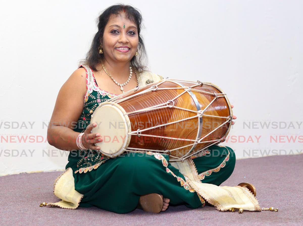 The woman on the dholak