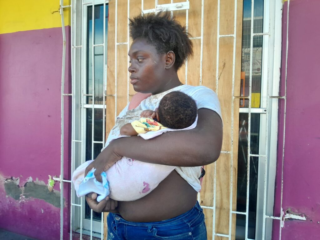 ‘There is no food, we sleep in fear’:  Mothers worry in storm-hit Black River