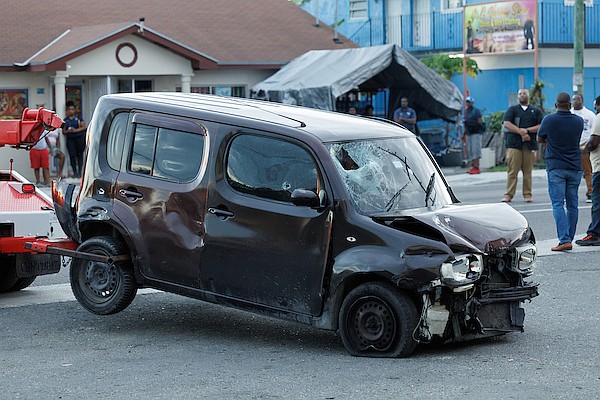 Shooting victim dies after he crashes car near supermarket