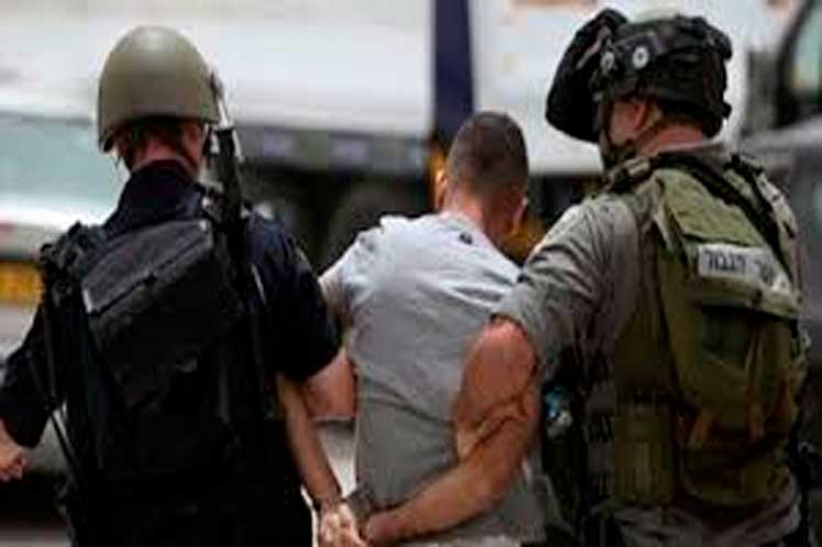 Israel arrests dozens of Palestinians after raids in the West Bank