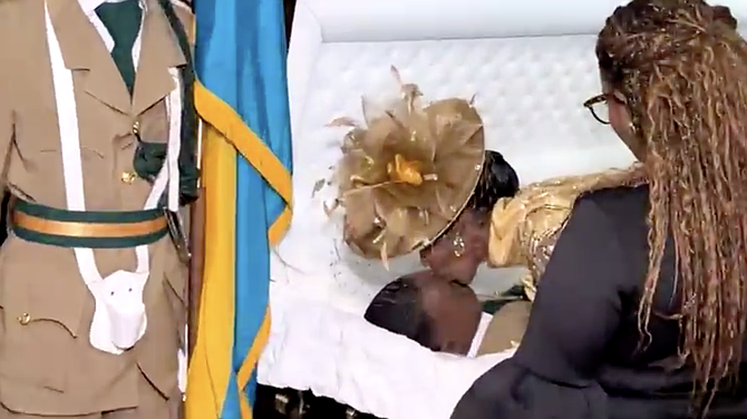 Mom kisses son ‘goodbye’ in funeral service for slain officer
