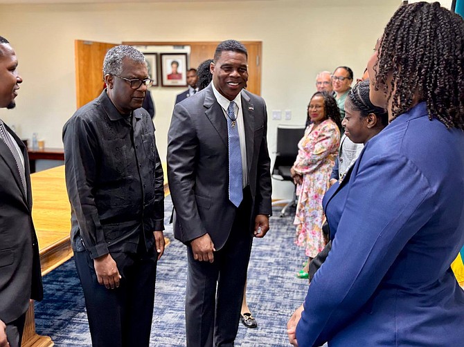 Mitchell welcomes new US Ambassador Herschel Walker