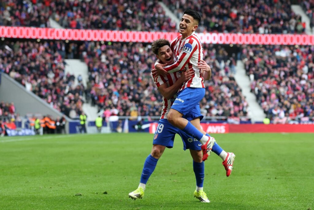 Atletico down Mallorca to tighten grip on third