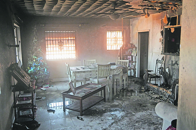 Neighbour helps rescue woman from house fire