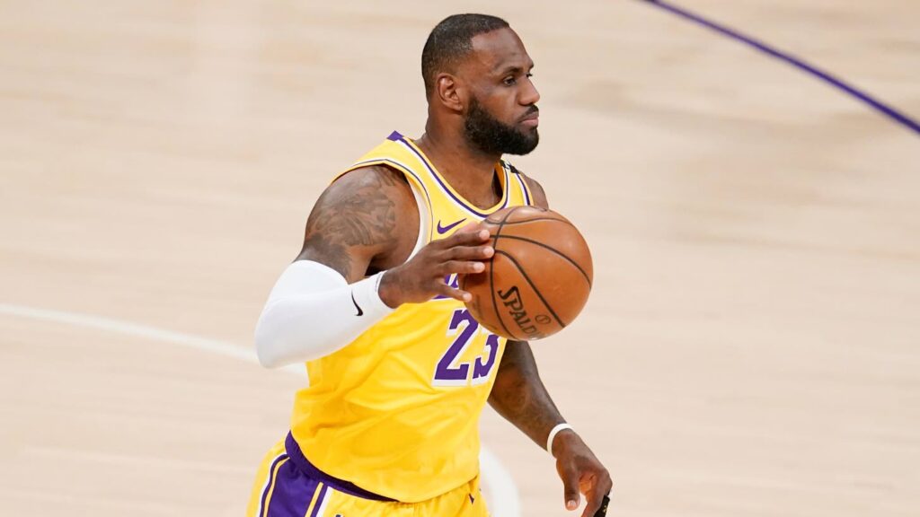 LeBron James ties NBA record for most regular-season games played