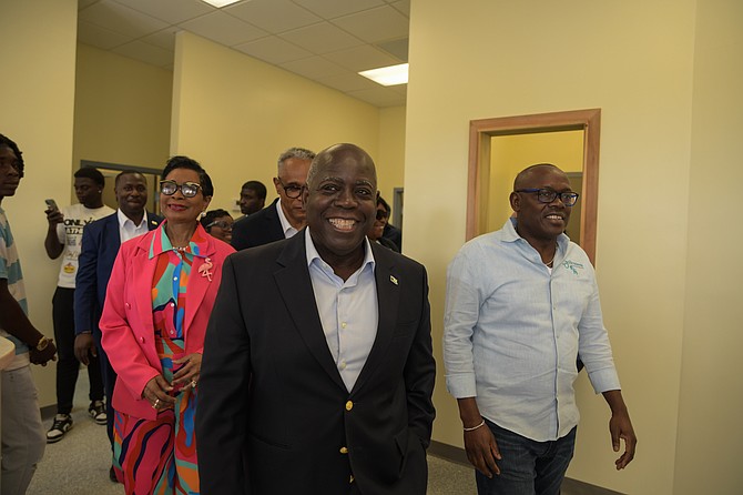PM tours his constituency to Bahamians open clinics and sign airport deal