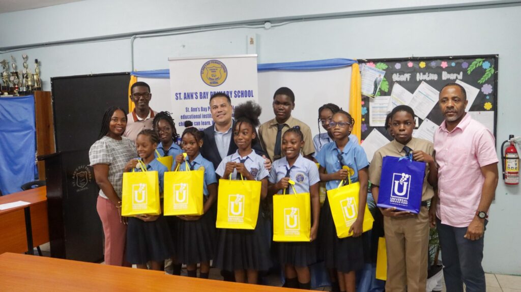 MP Samuda commends USF Connect a Child Programme as investment in students’ digital future