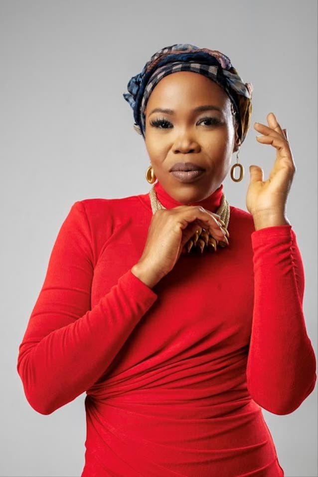 Queen Ifrica paints portrait with Mom Like Me