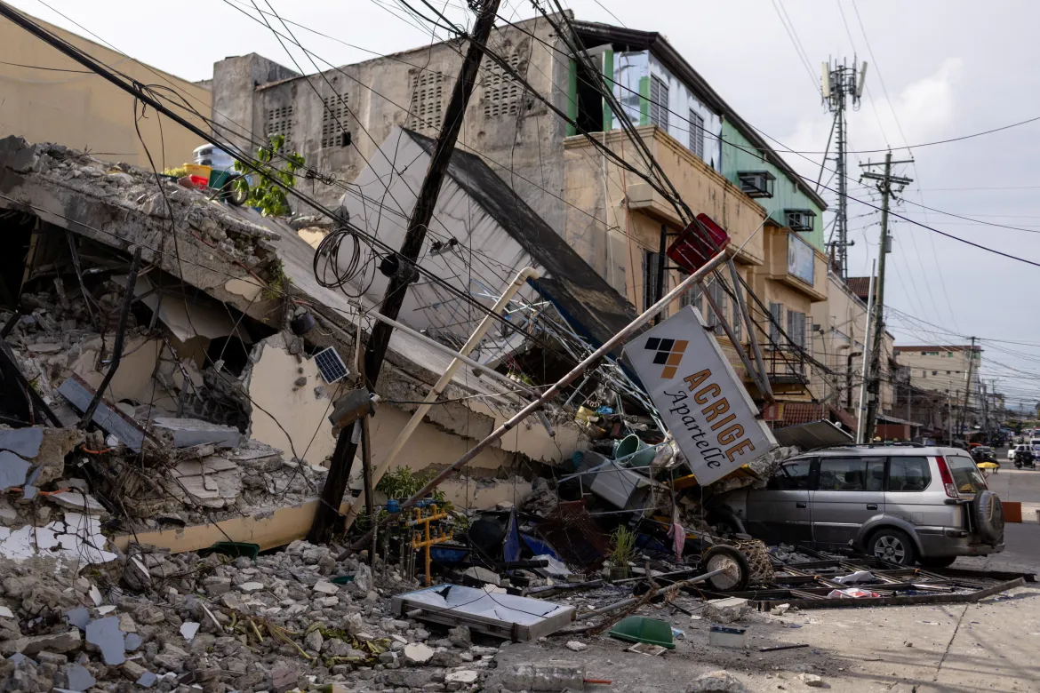 A 7.8 magnitude quake in the Philippines kills at least 32, collapses buildings and sparks tsunami