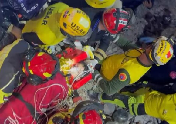 Dominican rescuers pull child alive from Venezuela rubble after five days