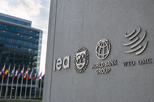 Global Institutions: Crisis Easing; Not Yet Over
