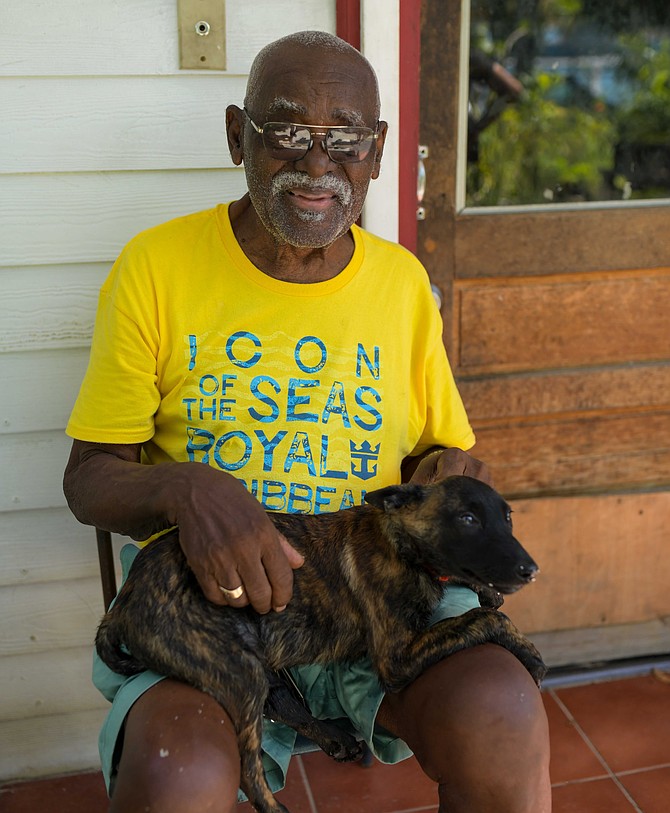 Duke Strachan smiles again as prison officials deliver puppy