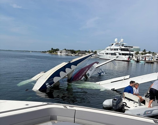 Ten escape uninjured after seaplane strikes Bimini dock
