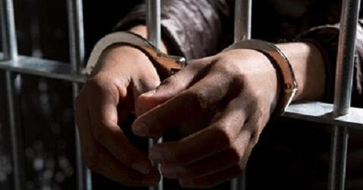 Woman prison officer arrested